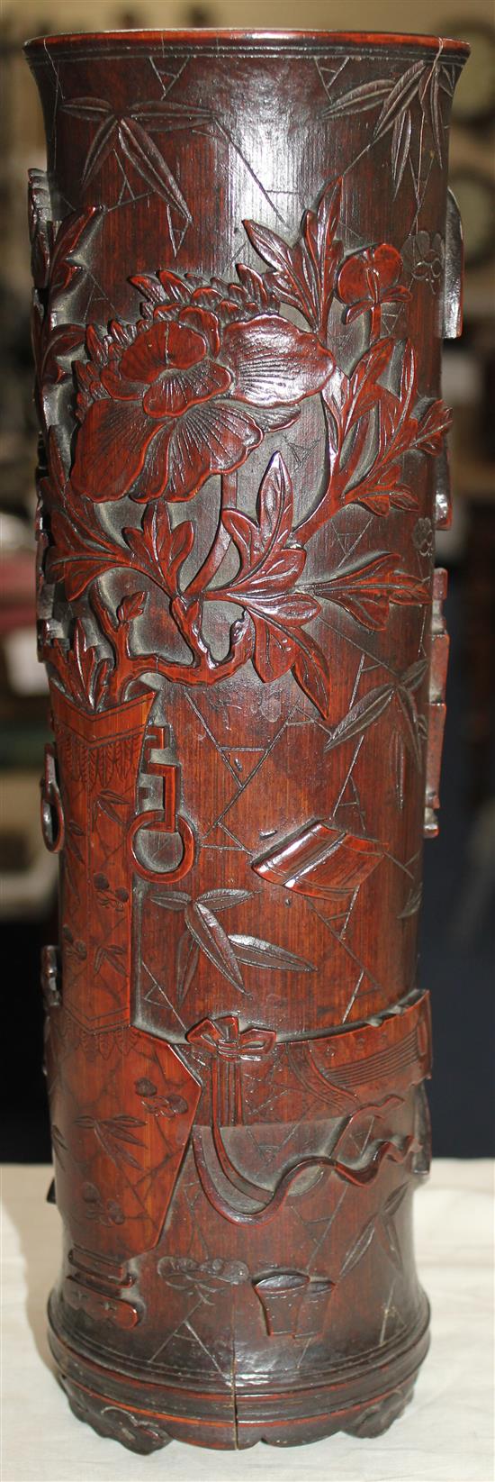 A Chinese bamboo hundred antiques cylindrical brush pot, 19th century, 34cm